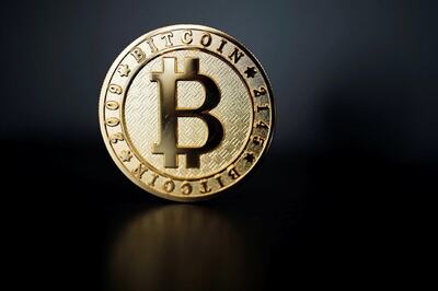 Bitcoin Hovers Near Record of $52,640 as Dollar Rallies on US Recovery Hopes