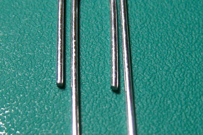 How to Bend a Paper Clip to Hang Light Objects on Cubicle Walls