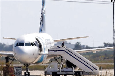 EgyptAir plane hostage drama ends; hijacker arrested, passengers freed