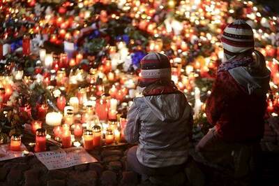 Father, brother of one of Paris suicide attackers placed in custody: sources