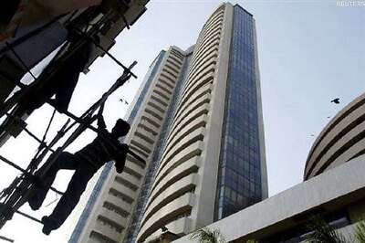 Sensex closes 212 points up; auto stocks rally