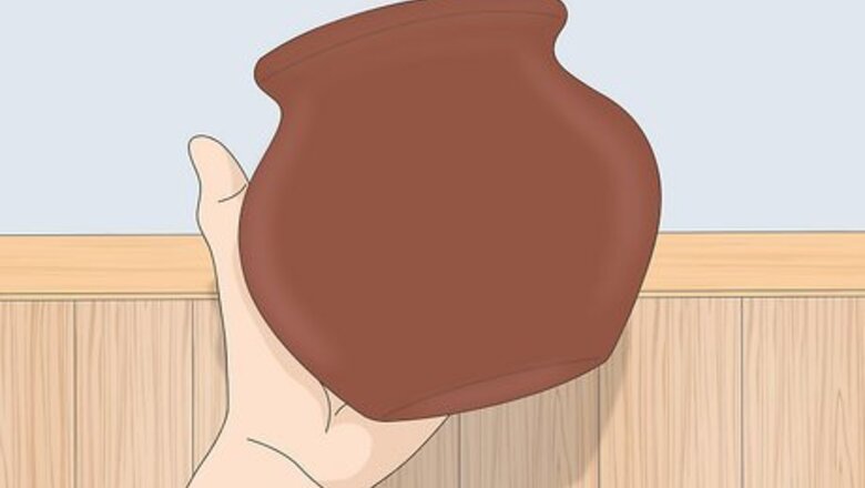 How to Create a Raised M‐Seal Design for a Painted Terracotta Pot