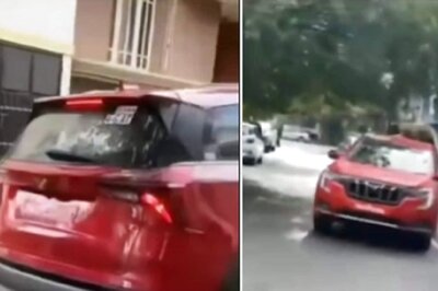 Upcoming Mahindra XUV 700 SUV Spied Wearing Red Paint Ahead of Official Unveil