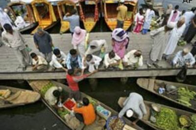 Protests against land deal, curfew in Kashmir areas