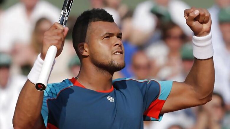 Tsonga overcomes Nieminen to enter third round at Roland Garros