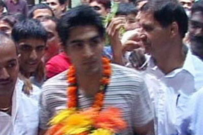 Boxer Vijender back home with bronze, India cheerful