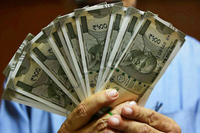 Rupee Moves up 2 Paise Against Dollar