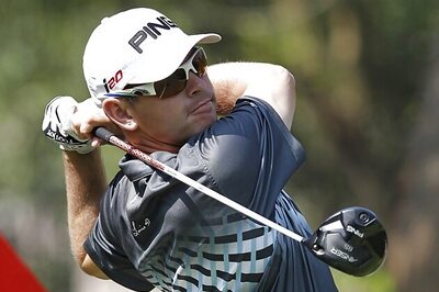 Oosthuizen, Scott share HSBC Champions lead