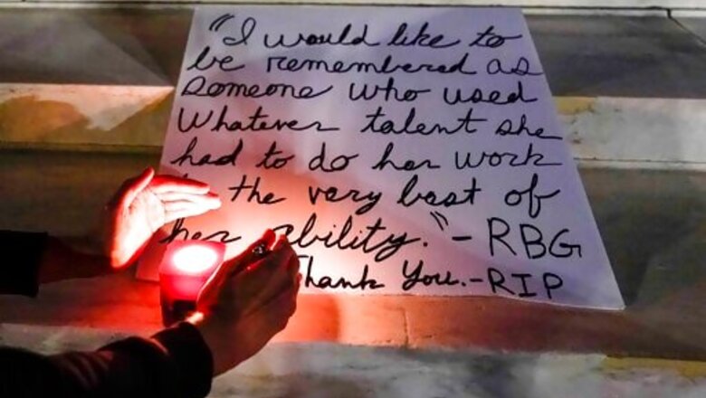 Flowers, Homemade Signs By High Court In Ginsburg Tribute