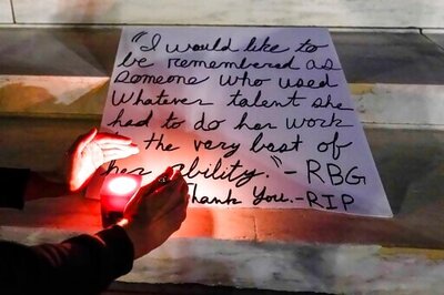 Flowers, Homemade Signs By High Court In Ginsburg Tribute