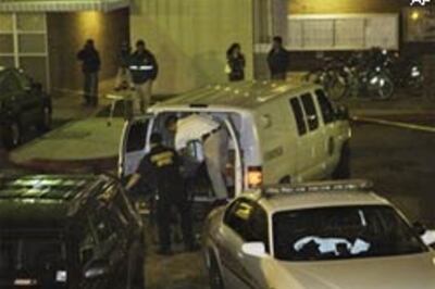 LSU shooting: Hunt on for 'black' men | AP family mourns