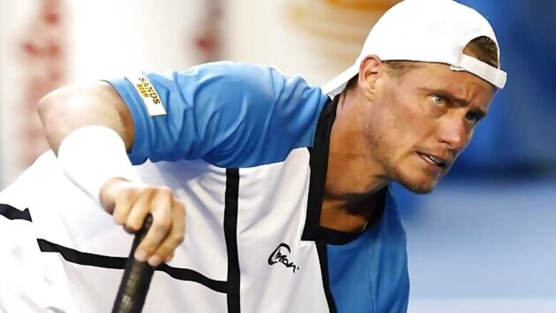 Lleyton Hewitt out in first round at Australian Open