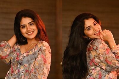 Actress Megha Shetty Looks Cute In A Multicoloured Floral Printed Top And Black Trousers