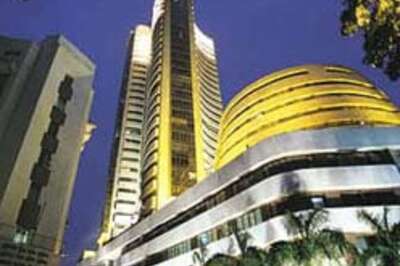 Markets end higher amid volatile trade