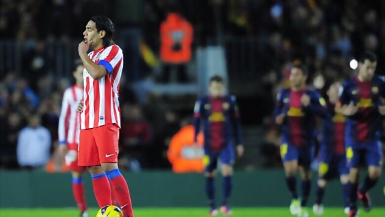 Messi scores twice as Barcelona beat Atletico 4-1