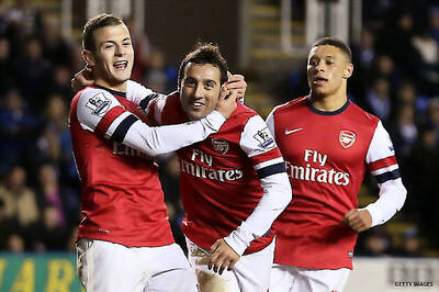 Cazorla hat-trick helps Arsenal rout Reading 5-2