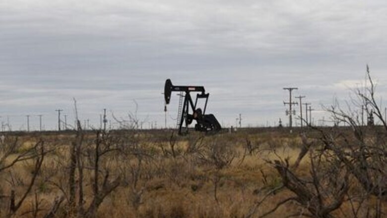 Oil edges up after sharp U.S. crude inventory drop