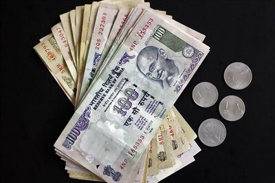 Rupee loses 22 paise, opens at 62.05 vs US $