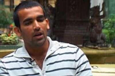 Protestors burn effigies, deface posters