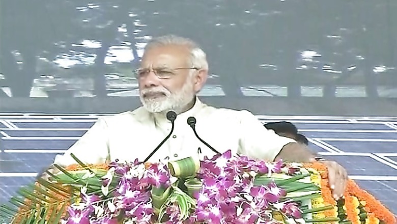 Terming Bapu his 'inspiration', Modi bats for saving environment