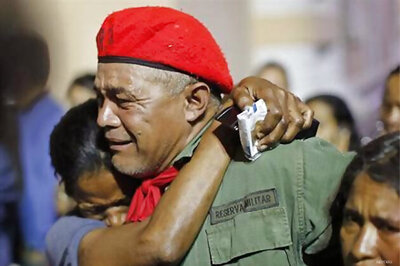 Venezuelans mourn Chavez on the first anniversary, protest continues