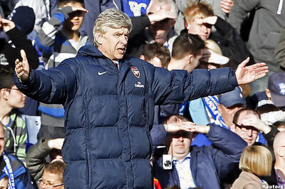 Arsene Wenger Warns Barcelona