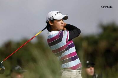 Tseng lifts British Open amidst tears