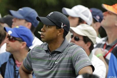 Woods back, two shots behind Couples