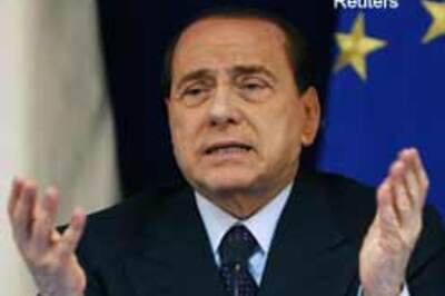 Berlusconi: Obama? He's young, handsome, and tanned