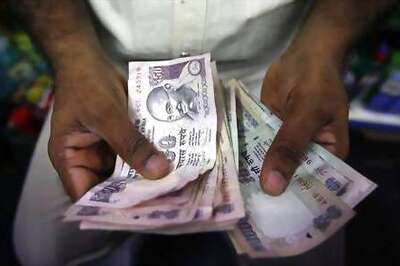 Rupee opens at 61.85 vs dollar, lower 23 paise