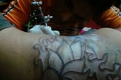 Tattoos to heal scarred look, to weave cheer into life