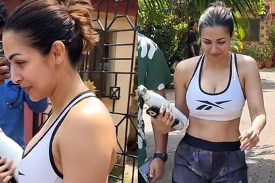Sexy! Malaika Arora Rocks A White Sports Bra And Grey Shorts As She Gets Snapped At Her Yoga Class; Watch