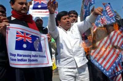 Two Australians held for attacking an Indian