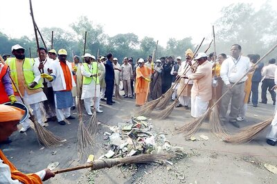 Donning Cap, Mask Uttar Pradesh Chief Minister Yogi Adityanath Sweeps Outside Taj Mahal After Controversy