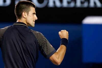 Djokovic holds off Wawrinka; Sharapova advances