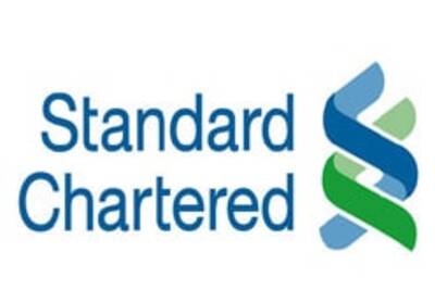 Standard Chartered to buy stake in UTI