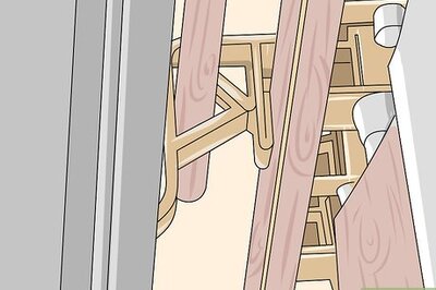How to Hang Curtains over Vertical Blinds