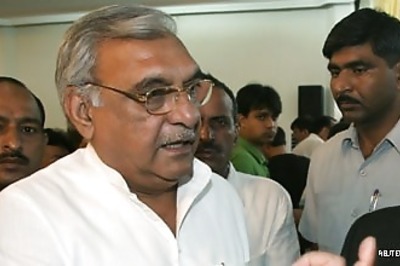 Those in AC rooms should visit villages, says Hooda