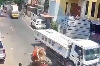 Bengaluru Biker Narrowly Escapes Truck Wheels After Bull Jumps On Him; Video Goes Viral