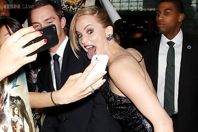 Jennifer Lawrence almost repeats her Oscar fall  at the 'X-Men' premiere