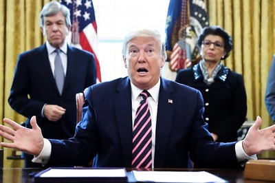 Trump Says Masks a 'Double-edged Sword.' Goldman Sachs Says They Could Help Save US Economy