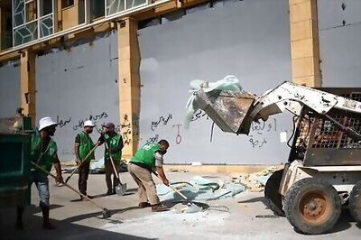 Furious Lebanese count their losses from blast, plan demonstration