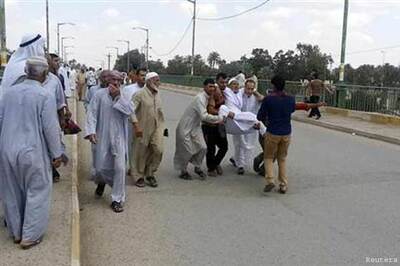 Iraq: Two blasts outside Sunni Muslim mosque kill 76