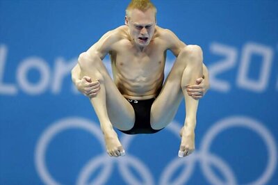 Zakharov's diving gold prevents China sweep