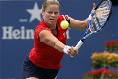 Clijsters sets up Henin final in Brisbane