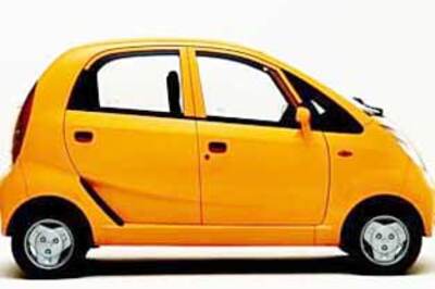 India's first women photographer waiting for Nano car