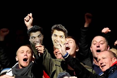 Police probe racist gesture by Liverpool fan