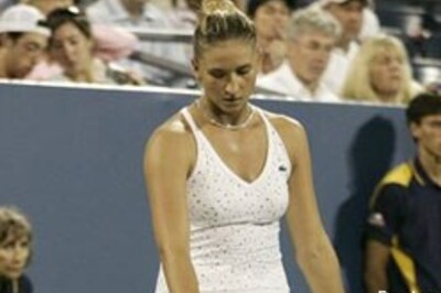 Henin, Williams sisters enter second round