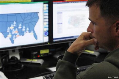 Cyber warfare already here, UK spy agency chief says