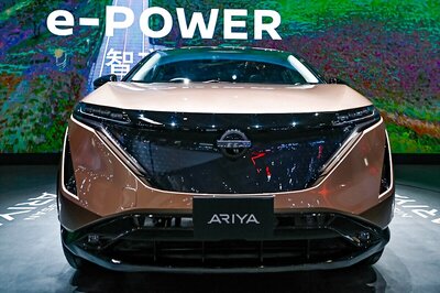 China Auto Show Runs Packed with Crowds in Masks Following Delay Due to Covid-19